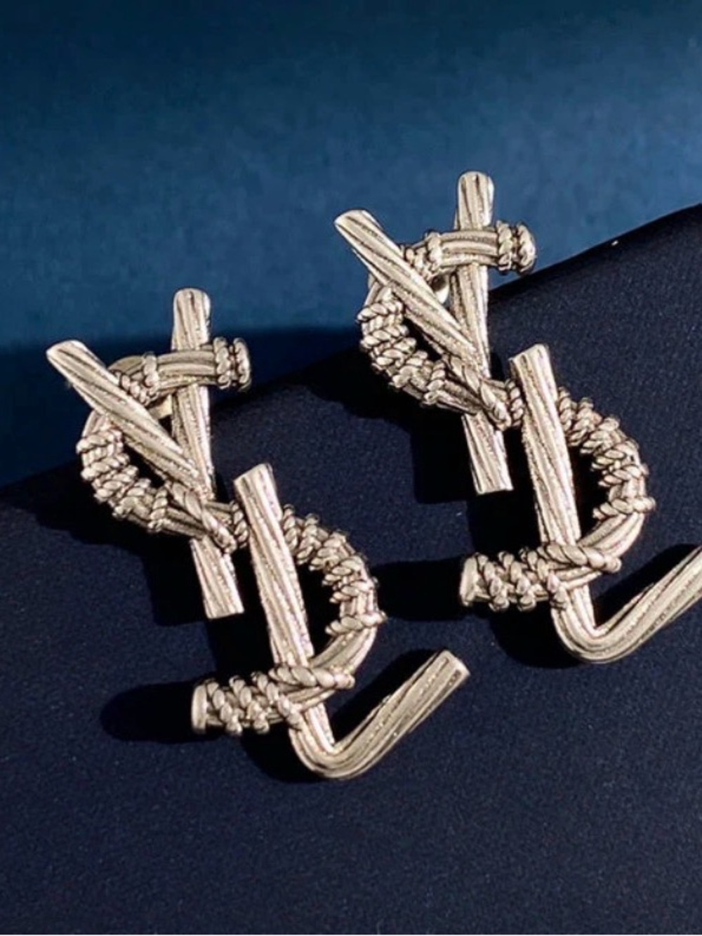Fashion inspired Silver Knot Logo Drop Earrings stamped